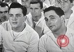 Image of standing watch United States USA, 1943, second 27 stock footage video 65675059920