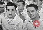 Image of standing watch United States USA, 1943, second 28 stock footage video 65675059920