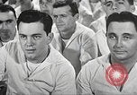 Image of standing watch United States USA, 1943, second 30 stock footage video 65675059920