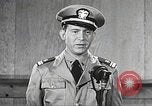 Image of standing watch United States USA, 1943, second 34 stock footage video 65675059920