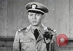 Image of standing watch United States USA, 1943, second 36 stock footage video 65675059920