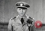 Image of standing watch United States USA, 1943, second 37 stock footage video 65675059920