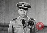 Image of standing watch United States USA, 1943, second 38 stock footage video 65675059920