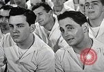 Image of standing watch United States USA, 1943, second 39 stock footage video 65675059920