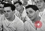 Image of standing watch United States USA, 1943, second 40 stock footage video 65675059920