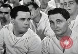 Image of standing watch United States USA, 1943, second 41 stock footage video 65675059920