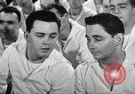 Image of standing watch United States USA, 1943, second 42 stock footage video 65675059920