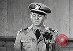 Image of standing watch United States USA, 1943, second 43 stock footage video 65675059920