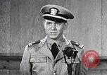 Image of standing watch United States USA, 1943, second 45 stock footage video 65675059920