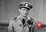 Image of standing watch United States USA, 1943, second 50 stock footage video 65675059920