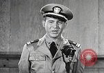 Image of standing watch United States USA, 1943, second 52 stock footage video 65675059920
