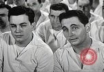 Image of standing watch United States USA, 1943, second 54 stock footage video 65675059920