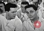 Image of standing watch United States USA, 1943, second 55 stock footage video 65675059920