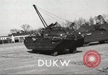 Standbild USA 6-wheel drive amphibious Truck United States USA, 1953, aus Sekunde 15 historischem Filmmaterial Videoclip 65675060085
