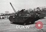Standbild USA 6-wheel drive amphibious Truck United States USA, 1953, aus Sekunde 16 historischem Filmmaterial Videoclip 65675060085