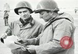 Immagine di Truppe alleate e attrezzature essendo portata a terra sulla spiaggia di Omaha Normandia Francia, 1944, secondo 15 filmato di repertorio 65675060099