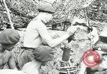Immagine di Truppe alleate e attrezzature essendo portata a terra sulla spiaggia di Omaha Normandia Francia, 1944, secondo 45 filmato di repertorio 65675060099