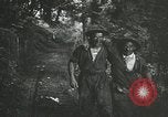 Immagine di Truppe alleate e attrezzature essendo portata a terra sulla spiaggia di Omaha Normandia Francia, 1944, secondo 50 filmato di repertorio 65675060099