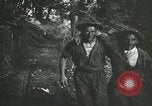 Immagine di Truppe alleate e attrezzature essendo portata a terra sulla spiaggia di Omaha Normandia Francia, 1944, secondo 51 filmato di repertorio 65675060099