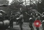 Image of emaciated corpses in concentration camp Bergen Germany, 1945, second 44 stock footage video 65675060115