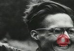 Image of emaciated corpses in concentration camp Bergen Germany, 1945, second 47 stock footage video 65675060115