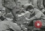 Image of emaciated corpses in concentration camp Bergen Germany, 1945, second 58 stock footage video 65675060115