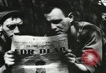 Image of emaciated corpses in concentration camp Bergen Germany, 1945, second 60 stock footage video 65675060115