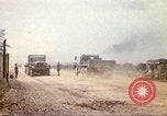Image of empty dump trcuks Hue Vietnam, 1971, second 32 stock footage video 65675060130