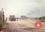 Image of empty dump trcuks Hue Vietnam, 1971, second 33 stock footage video 65675060130