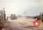 Image of empty dump trcuks Hue Vietnam, 1971, second 35 stock footage video 65675060130