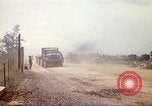 Image of empty dump trcuks Hue Vietnam, 1971, second 41 stock footage video 65675060130