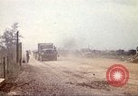 Image of empty dump trcuks Hue Vietnam, 1971, second 42 stock footage video 65675060130