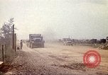 Image of empty dump trcuks Hue Vietnam, 1971, second 44 stock footage video 65675060130