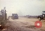 Image of empty dump trcuks Hue Vietnam, 1971, second 45 stock footage video 65675060130