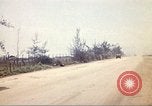 Image of empty dump trcuks Hue Vietnam, 1971, second 55 stock footage video 65675060130