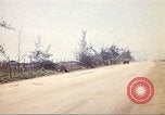 Image of empty dump trcuks Hue Vietnam, 1971, second 56 stock footage video 65675060130