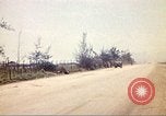 Image of empty dump trcuks Hue Vietnam, 1971, second 59 stock footage video 65675060130