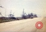Image of empty dump trcuks Hue Vietnam, 1971, second 60 stock footage video 65675060130