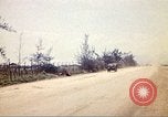 Image of empty dump trcuks Hue Vietnam, 1971, second 61 stock footage video 65675060130