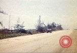 Image of empty dump trcuks Hue Vietnam, 1971, second 62 stock footage video 65675060130