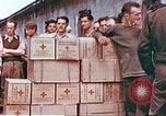 Image of Liberated American airmen and Red Cross aid at Stalag 7A prison camp Moosburg Germany, 1945, second 8 stock footage video 65675060145