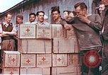 Image of Liberated American airmen and Red Cross aid at Stalag 7A prison camp Moosburg Germany, 1945, second 11 stock footage video 65675060145