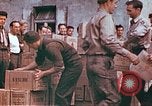 Image of Liberated American airmen and Red Cross aid at Stalag 7A prison camp Moosburg Germany, 1945, second 12 stock footage video 65675060145