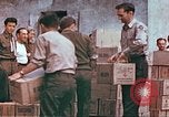 Image of Liberated American airmen and Red Cross aid at Stalag 7A prison camp Moosburg Germany, 1945, second 14 stock footage video 65675060145