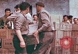 Image of Liberated American airmen and Red Cross aid at Stalag 7A prison camp Moosburg Germany, 1945, second 17 stock footage video 65675060145