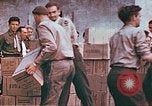 Image of Liberated American airmen and Red Cross aid at Stalag 7A prison camp Moosburg Germany, 1945, second 18 stock footage video 65675060145