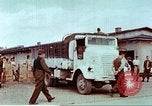 Image of Liberated American airmen and Red Cross aid at Stalag 7A prison camp Moosburg Germany, 1945, second 30 stock footage video 65675060145