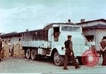 Image of Liberated American airmen and Red Cross aid at Stalag 7A prison camp Moosburg Germany, 1945, second 32 stock footage video 65675060145