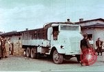 Image of Liberated American airmen and Red Cross aid at Stalag 7A prison camp Moosburg Germany, 1945, second 33 stock footage video 65675060145