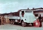 Image of Liberated American airmen and Red Cross aid at Stalag 7A prison camp Moosburg Germany, 1945, second 34 stock footage video 65675060145